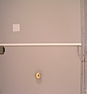 Porte à mécanisme d’ouverture électrique